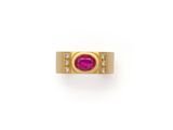 an oval ruby and diamond ring
