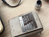 a small radio sitting on top of a table next to other electronics