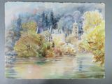 a watercolor painting of a castle on the water