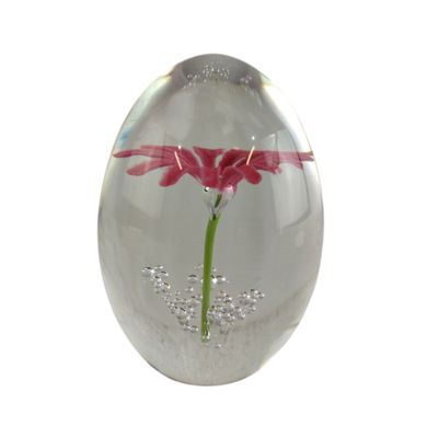 a glass vase with a red flower inside of it