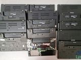 many laptops stacked up on top of each other