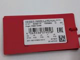 a close up of a red tag with a barcode on it