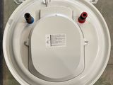 an overhead view of a toilet with the lid up