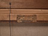 a close up of a piece of wood with a label on it