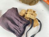 a bag of dog treats and a bag of dog treats on a table