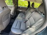 the back seats of a car are empty in the back of the car