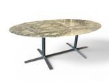 an image of a round marble table with a metal base