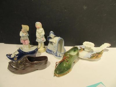 three figurines that are sitting on a table