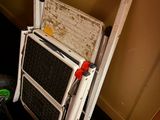 a small hand truck that is sitting on the floor
