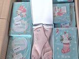a box full of baby items that are in it