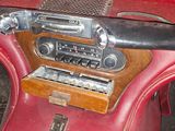 a radio in the center of a red car