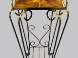an image of a small table with a flower design on it