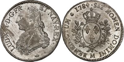 une pièce d'argent sur laquelle figure l'effigie d'un homme coiffé d'une couronne