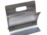 a metal holder with a handle on a white background