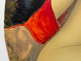 un tableau représentant une femme vêtue d'un haut rouge