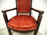 an image of a chair with a red velvet upholstered seat