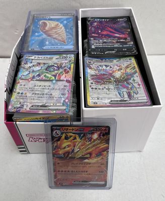 a lot of cards in the box on the table