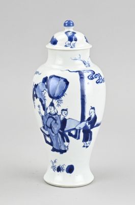 blue and white vase with a woman on a horse and a man on a horse