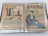 an open book with a picture of a woman in a dress and a man in a suit