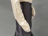 an image of a woman ' s white blouse and black skirt