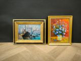 two paintings on the table next to each other