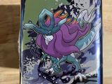 a close up of a pokemon wallet on a wooden surface