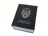 an image of a black box with a drawing of a man ' s face on it