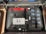 a suitcase that has a bunch of tools inside of it