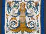 a blue and yellow square scarf with a woman and birds on it