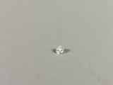 a close up of a single diamond on a white surface