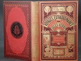 un livre rouge avec une couverture dorée et une couverture noire et rouge