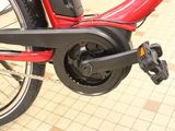 a close up of a bicycle with a chain attached to it