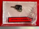 a picture of a car key in a red box