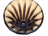 a black and white bowl with a black rim