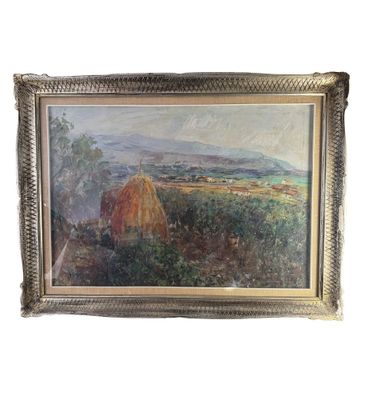 une peinture à l'huile représentant un paysage avec des balles de foin, dans un cadre doré