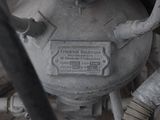 a close up of a metal object with a sign on it