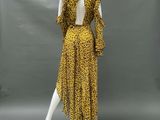 a yellow leopard print dress on a mannequin mannequin mannequin mannequin mannequin mannequin mannequin mannequin mann