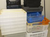 many plastic containers stacked on top of each other