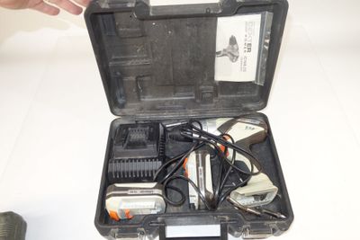 a black case with tools in it sitting on a table
