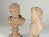 two marble busts of a man and a woman