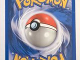 a close up of a pokemon card on a white surface