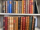 many old books on the shelves in the room