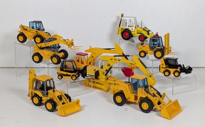 de nombreux véhicules de chantier miniatures exposés