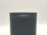 a close up of a bose bluetooth speaker on a white background