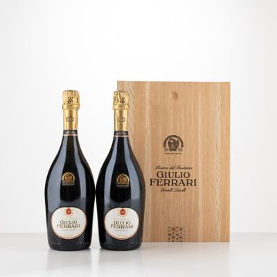 two bottles of wine in front of a wooden box