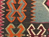 an image of a colorful rug with many different designs