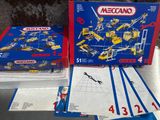 two boxes of legos sitting on top of each other