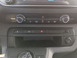 a radio in the center of a car ' s dashboard