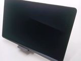 a picture of a black tablet on a white table