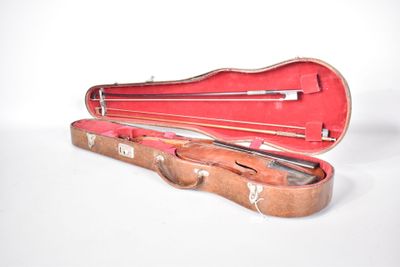 a violin case with a violin in it on a white surface